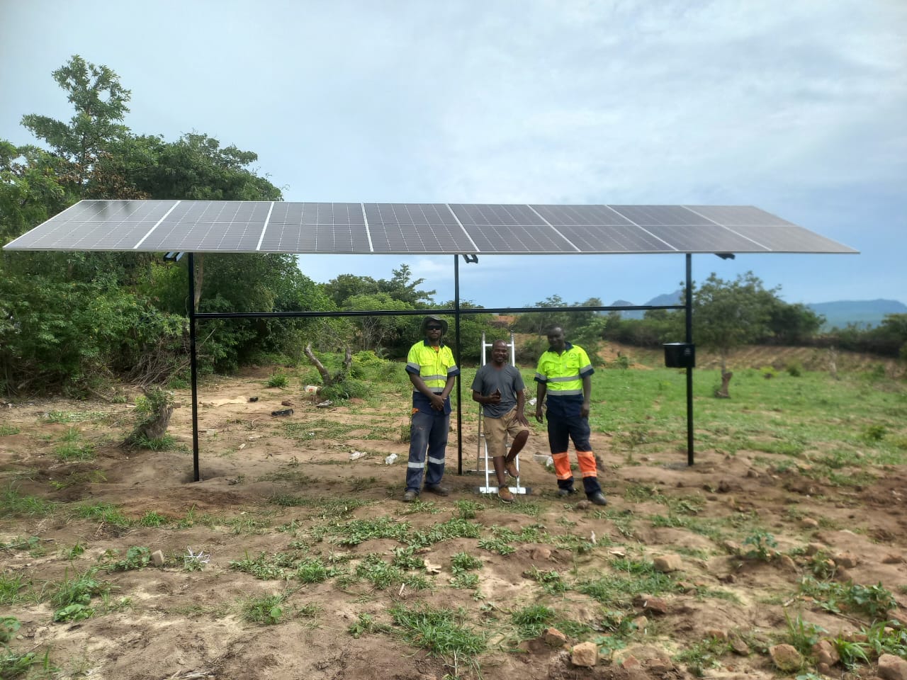 Technician reviewing schematics during a power system audit